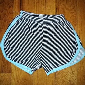 Black and White Striped Athletic Shorts with Dolphin Hem